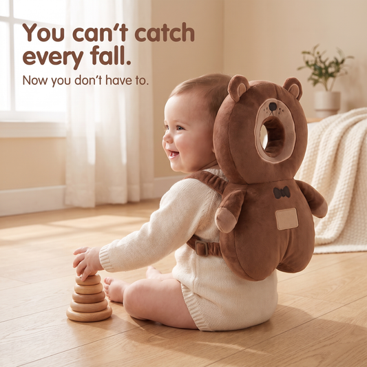 Baby sitting on a wooden floor wearing the bear head cushion backpack